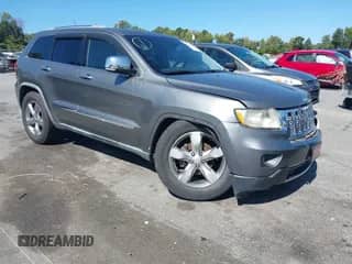2012 Jeep Grand Cherokee Overland z VIN 1C4RJFCG5CC123859, wystawiony jako IAAI lot #43308774 z przebiegiem 204 190 mil mil oraz . Historia ofert i sprzedaży dostępna na DreamBid. Obrazek 1.