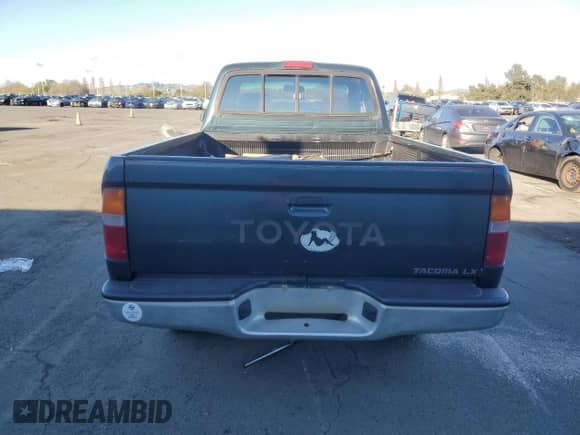 1997 Toyota Tacoma z VIN 4TAWM72N4VZ324227, wystawiony jako Copart lot #50633325 z przebiegiem 296 625 mil mil oraz Czysty tytuł • Clean title. Historia ofert i sprzedaży dostępna na DreamBid. Obrazek 6.