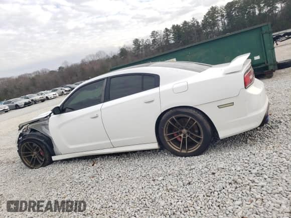 2013 Dodge Charger SRT-8 z VIN 2C3CDXEJ9DH529531, wystawiony jako Copart lot #44437995 z przebiegiem 123 146 mil mil oraz Szkoda całkowita • Salvage title. Historia ofert i sprzedaży dostępna na DreamBid. Obrazek 2.