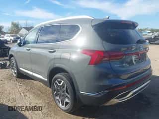 2023 Hyundai Santa Fe Limited z VIN 5NMS5DA15PH010672, wystawiony jako IAAI lot #43376300 z przebiegiem 30 999 mil mil oraz . Historia ofert i sprzedaży dostępna na DreamBid. Obrazek 3.