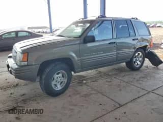 1998 Jeep Grand Cherokee Laredo с VIN 1J4GZ48SXWC213248, выставлен на аукционе Copart как лот 70193535 с пробегом 239 217 миль миль и Списание • Salvage title. История ставок и продаж доступна на DreamBid. Изображение 1.