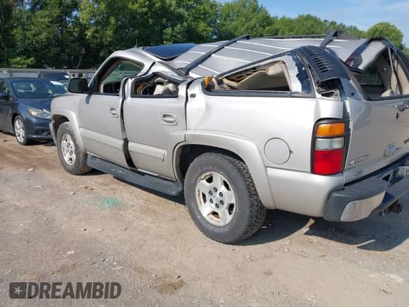 2005 Chevrolet Tahoe LT with VIN 1GNEC13T85R177219, listed as a IAAI auction lot 42970376 with 210,481 mi miles and . Bid and sale history available at DreamBid. Image 3.