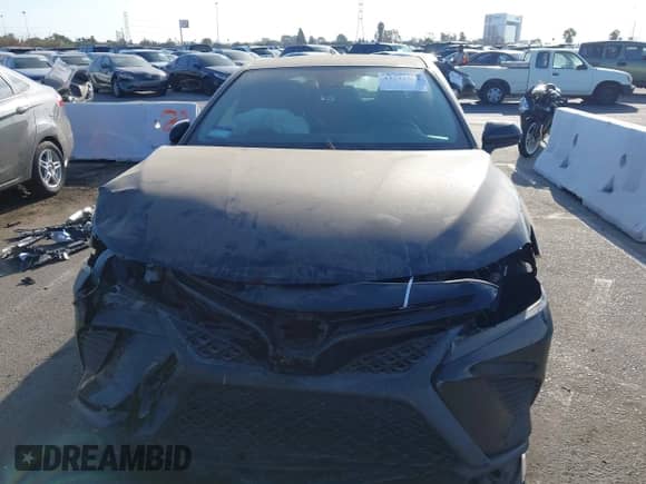 2019 Toyota Camry SE z VIN 4T1B11HK1KU704880, wystawiony jako IAAI lot #43241503 z przebiegiem 96 395 mil mil oraz . Historia ofert i sprzedaży dostępna na DreamBid. Obrazek 13.