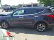 2016 Hyundai Santa Fe z VIN 5XYZUDLB6GG306186, wystawiony jako IAAI lot #42797325 z przebiegiem 53 410 mil mil oraz . Historia ofert i sprzedaży dostępna na DreamBid. Obrazek 14.