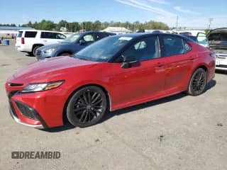 2021 Toyota Camry XSE with VIN 4T1K61BK1MU042845, listed as a Copart auction lot 71916955 with 86,733 mi miles and Salvage title. Bid and sale history available at DreamBid. Image 1.