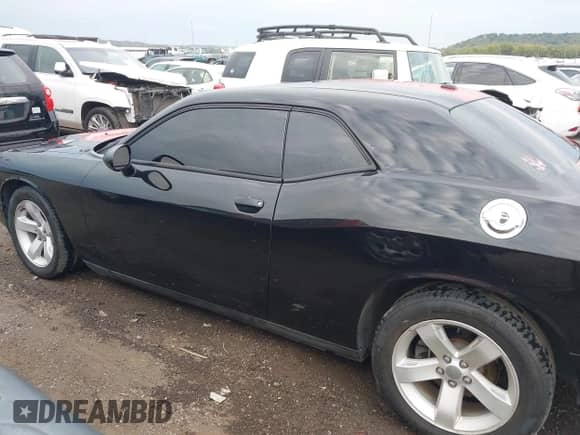 2013 Dodge Challenger SXT Plus с VIN 2C3CDYAG1DH517969, выставлен на аукционе IAAI как лот 43414279 с пробегом 180 433 миль миль и . История ставок и продаж доступна на DreamBid. Изображение 14.