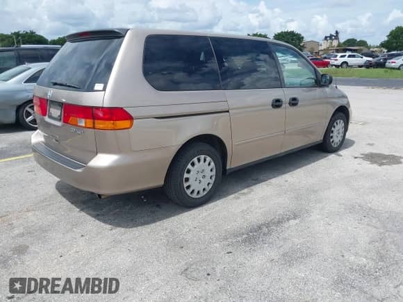 2004 Honda Odyssey LX with VIN 5FNRL18544B143755, listed as a IAAI auction lot 42733074 with 142,019 mi miles and . Bid and sale history available at DreamBid. Image 4.