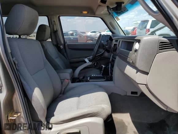2006 Jeep Commander z VIN 1J8HH48K46C203109, wystawiony jako Copart lot #65867435 z przebiegiem 191 804 mil mil oraz Szkoda całkowita • Salvage title. Historia ofert i sprzedaży dostępna na DreamBid. Obrazek 7.