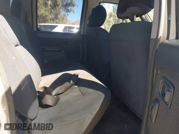 2004 Nissan Frontier XE with VIN 1N6ED27T14C447122, listed as a IAAI auction lot 43476223 with 239,991 mi miles and . Bid and sale history available at DreamBid. Image 8.