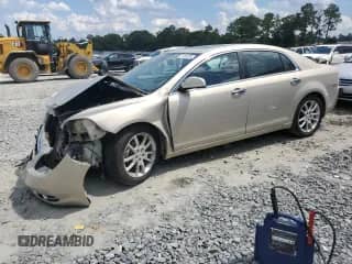 2010 Chevrolet Malibu LTZ with VIN 1G1ZE5EB3AF213774, listed as a Copart auction lot 71156795 with 238,598 mi miles and Salvage title. Bid and sale history available at DreamBid. Image 1.