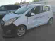 2013 Chevrolet Spark LT с VIN KL8CD6S90DC507249, выставлен на аукционе Copart как лот 82360865 с пробегом 276 434 миль миль и Списание • Salvage title. История ставок и продаж доступна на DreamBid. Изображение 1.