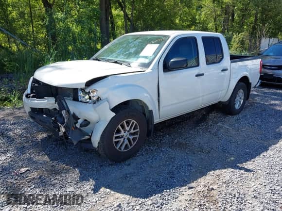 2019 Nissan Frontier SV with VIN 1N6AD0EV2KN873538, listed as a IAAI auction lot 43003970 with 90,588 mi miles and . Bid and sale history available at DreamBid. Image 2.