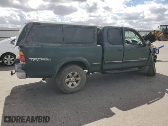 2001 Toyota Tundra Limited z VIN 5TBBT481X1S139032, wystawiony jako Copart lot #56427375 z przebiegiem 326 746 mil mil oraz Szkoda całkowita • Salvage title. Historia ofert i sprzedaży dostępna na DreamBid. Obrazek 3.