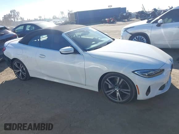 2022 BMW 4 Series 430i with VIN WBA23AT00NCJ33717, listed as a IAAI auction lot 43362808 with 72,222 mi miles and . Bid and sale history available at DreamBid. Image 14.