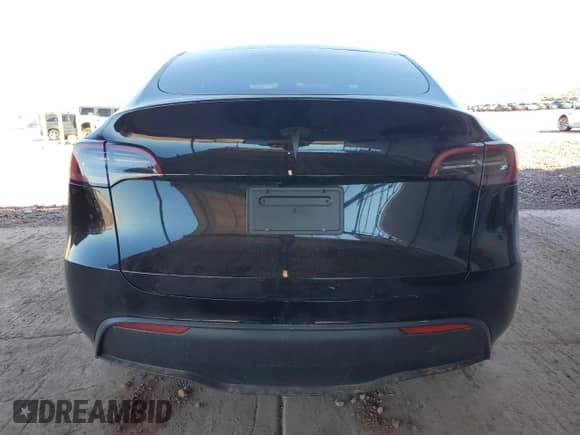 2024 Tesla Model Y с VIN 7SAYGDED1RF198302, выставлен на аукционе Copart как лот 83856115 с пробегом 12 875 миль миль и Списание • Salvage title. История ставок и продаж доступна на DreamBid. Изображение 6.