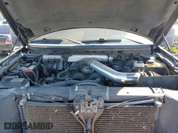 2007 Ford F-150 XLT z VIN 1FTPX045X7KC54622, wystawiony jako Copart lot #72048374 z przebiegiem 20 239 mil mil oraz Szkoda całkowita • Salvage title. Historia ofert i sprzedaży dostępna na DreamBid. Obrazek 11.