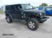 2007 Jeep Wrangler Unlimited Sahara z VIN 1J8GA59187L104774, wystawiony jako IAAI lot #42485359 z przebiegiem 192 254 mil mil oraz . Historia ofert i sprzedaży dostępna na DreamBid. Obrazek 1.