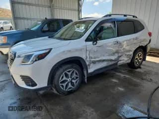 2022 Subaru Forester Premium z VIN JF2SKADC1NH502409, wystawiony jako Copart lot #69141605 z przebiegiem 34 585 mil mil oraz Szkoda całkowita • Salvage title. Historia ofert i sprzedaży dostępna na DreamBid. Obrazek 1.