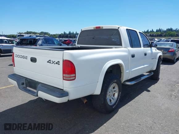 2002 Dodge Dakota Sport с VIN 1B7HG38N42S709487, выставлен на аукционе IAAI как лот 42820462 с пробегом 165 695 миль миль и . История ставок и продаж доступна на DreamBid. Изображение 4.