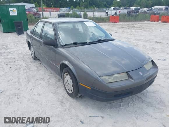 1994 Saturn SL with VIN 1G8ZF559XRZ190063, listed as a IAAI auction lot 42467911 with 66,680 mi miles and . Bid and sale history available at DreamBid. Image 1.