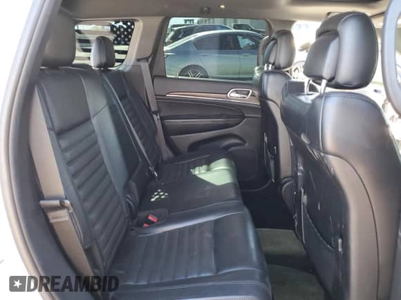2018 Jeep Grand Cherokee Sterling с VIN 1C4RJFBTXJC221166, выставлен на аукционе Copart как лот 65996575 с пробегом 140 062 миль миль и Списание • Salvage title. История ставок и продаж доступна на DreamBid. Изображение 11.