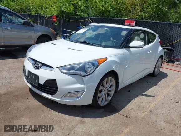 2013 Hyundai Veloster w/Black Int z VIN KMHTC6AD5DU113297, wystawiony jako IAAI lot #42653393 z przebiegiem 102 336 mil mil oraz . Historia ofert i sprzedaży dostępna na DreamBid. Obrazek 17.