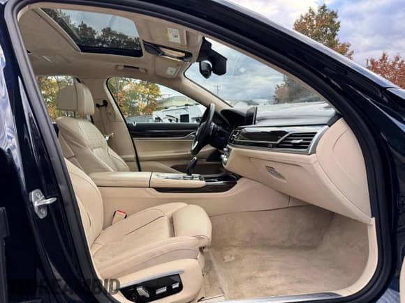 2016 BMW 7 Series 750i xDrive с VIN WBA7F2C51GG417271, выставлен на аукционе Copart как лот 90135155 с пробегом 92 844 миль миль и Чистый • Clean title. История ставок и продаж доступна на DreamBid. Изображение 11.