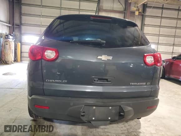 2009 Chevrolet Traverse 1LT with VIN 1GNEV23D29S174484, listed as a Copart auction lot 61020785 with 169,079 mi miles and Salvage title. Bid and sale history available at DreamBid. Image 6.