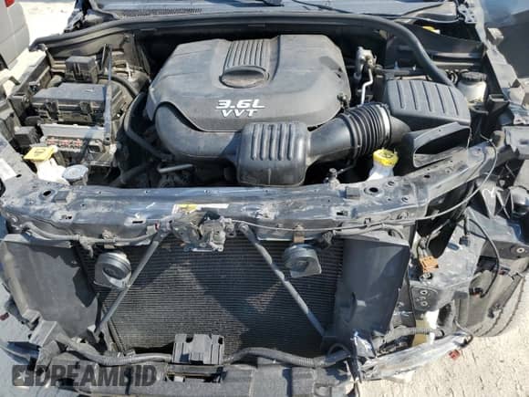 2013 Jeep Grand Cherokee Limited с VIN 1C4RJEBG3DC646620, выставлен на аукционе Copart как лот 70085865 с пробегом 123 471 миль миль и Списание • Salvage title. История ставок и продаж доступна на DreamBid. Изображение 12.