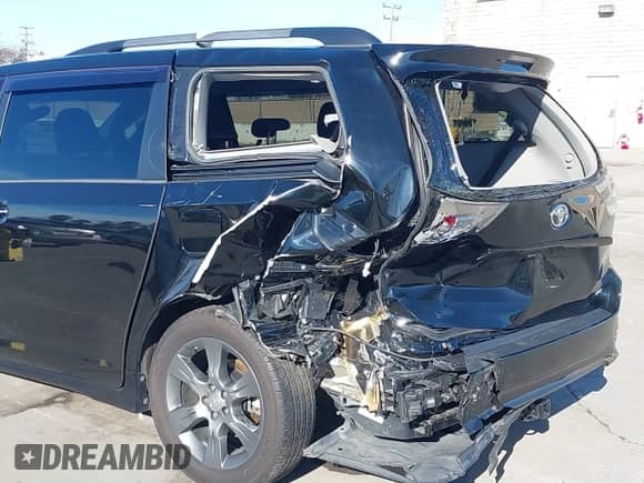 2015 Toyota Sienna SE with VIN 5TDXK3DC4FS583841, listed as a IAAI auction lot 41223820 with 190,117 mi miles and . Bid and sale history available at DreamBid. Image 6.