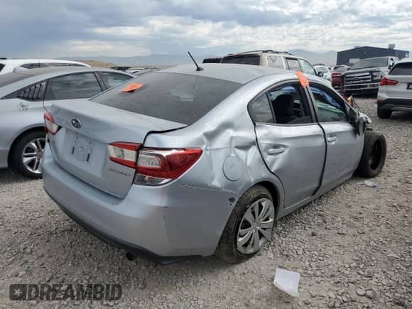 2018 Subaru Impreza z VIN 4S3GKAA62J3604568, wystawiony jako Copart lot #69947105 z przebiegiem Nie podano mil oraz Szkoda całkowita • Salvage title. Historia ofert i sprzedaży dostępna na DreamBid. Obrazek 3.