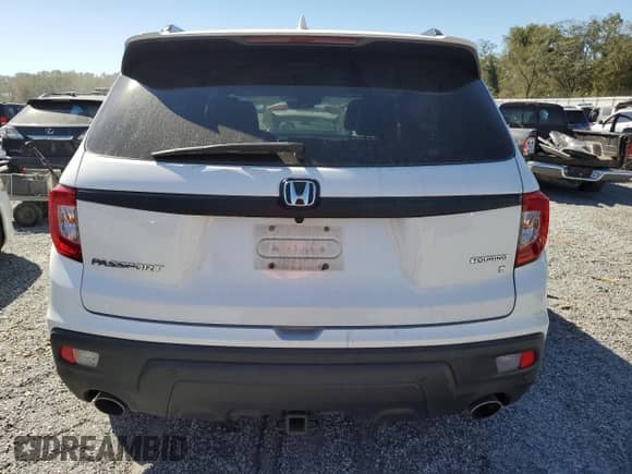 2020 Honda Passport Touring with VIN 5FNYF7H94LB003700, listed as a Copart auction lot 75535544 with Not provided miles and Salvage title. Bid and sale history available at DreamBid. Image 6.