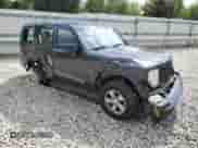 2011 Jeep Liberty Sport with VIN 1J4PN2GK7BW560109, listed as a Copart auction lot 82042155 with 145,599 mi miles and Salvage title. Bid and sale history available at DreamBid. Image 4.