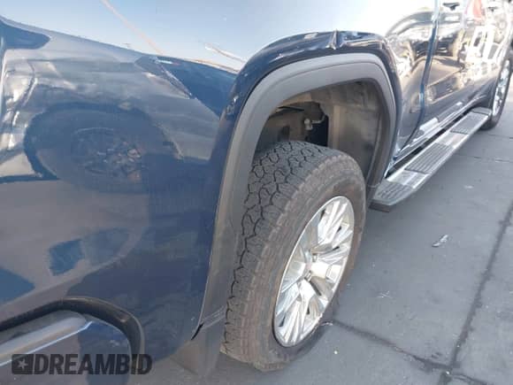 2023 GMC Sierra 1500 Denali z VIN 1GTUUGELXPZ168669, wystawiony jako IAAI lot #43378099 z przebiegiem 67 294 mil mil oraz . Historia ofert i sprzedaży dostępna na DreamBid. Obrazek 12.