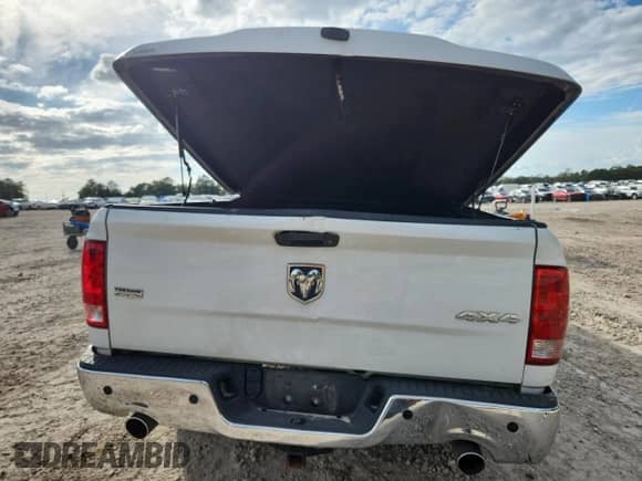 2012 Ram 1500 Laramie with VIN 1C6RD7JTXCS155717, listed as a Copart auction lot 82376395 with 150,035 mi miles and Salvage title. Bid and sale history available at DreamBid. Image 6.