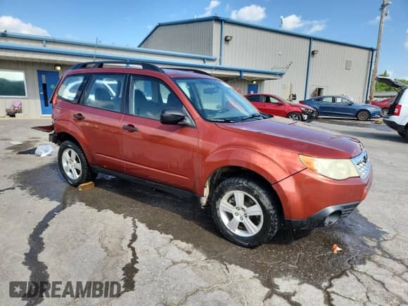 2011 Subaru Forester X z VIN JF2SHABC4BG759809, wystawiony jako Copart lot #65534595 z przebiegiem 169 758 mil mil oraz Szkoda całkowita • Salvage title. Historia ofert i sprzedaży dostępna na DreamBid. Obrazek 4.