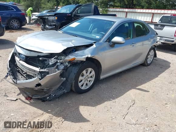 2021 Toyota Camry Hybrid LE with VIN 4T1C31AK3MU549454, listed as a IAAI auction lot 43138660 with 144,272 mi miles and . Bid and sale history available at DreamBid. Image 2.