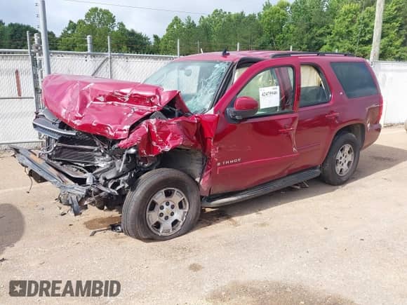 2007 Chevrolet Tahoe LTZ with VIN 1GNFC13J47J272221, listed as a IAAI auction lot 42475940 with Not provided miles and . Bid and sale history available at DreamBid. Image 2.