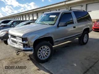 1999 Chevrolet Tahoe с VIN 3GNEK18R9XG152347, выставлен на аукционе Copart как лот 80785154 с пробегом 301 018 миль миль и Списание • Salvage title. История ставок и продаж доступна на DreamBid. Изображение 1.
