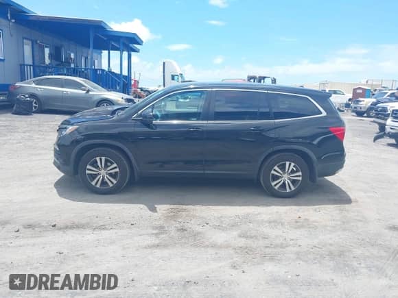 2018 Honda Pilot EX with VIN 5FNYF6H32JB014472, listed as a IAAI auction lot 43000601 with 50,575 mi miles and . Bid and sale history available at DreamBid. Image 14.