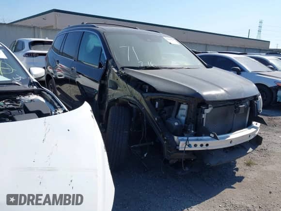 2022 Honda Pilot Special Edition with VIN 5FNYF5H24NB011709, listed as a IAAI auction lot 42604120 with 57,676 mi miles and . Bid and sale history available at DreamBid. Image 1.