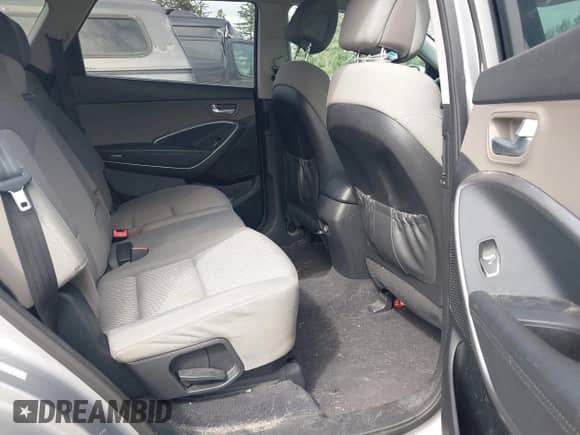 2016 Hyundai Santa Fe SE with VIN KM8SMDHF9GU162155, listed as a IAAI auction lot 43178113 with 148,621 mi miles and . Bid and sale history available at DreamBid. Image 8.