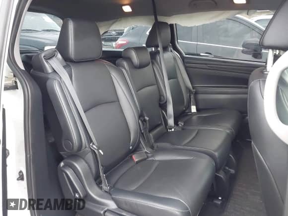 2023 Honda Odyssey EX-L with VIN 5FNRL6H6XPB055979, listed as a IAAI auction lot 42443479 with 61,873 mi miles and . Bid and sale history available at DreamBid. Image 8.