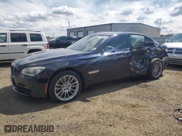 2014 BMW 7 Series 750i xDrive с VIN WBAYB6C59ED225179, выставлен на аукционе Copart как лот 72064245 с пробегом 117 561 миль миль и Списание • Salvage title. История ставок и продаж доступна на DreamBid. Изображение 1.