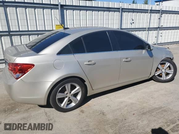 2014 Chevrolet Cruze 2LT z VIN 1G1PE5SB6E7423460, wystawiony jako Copart lot #86853305 z przebiegiem 192 898 mil mil oraz Szkoda całkowita • Salvage title. Historia ofert i sprzedaży dostępna na DreamBid. Obrazek 3.