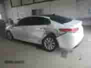 2016 Kia Optima EX with VIN 5XXGU4L34GG032331, listed as a Copart auction lot 71557155 with 127,419 mi miles and Salvage title. Bid and sale history available at DreamBid. Image 2.