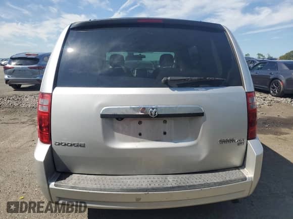 2010 Dodge Grand Caravan Hero z VIN 2D4RN3D19AR412103, wystawiony jako Copart lot #80083505 z przebiegiem 153 623 mil mil oraz Szkoda całkowita • Salvage title. Historia ofert i sprzedaży dostępna na DreamBid. Obrazek 6.