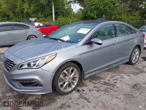 2016 Hyundai Sonata Sport z VIN 5NPE34AB6GH413252, wystawiony jako IAAI lot #43559132 z przebiegiem 99 565 mil mil oraz . Historia ofert i sprzedaży dostępna na DreamBid. Obrazek 2.