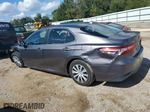 2019 Toyota Camry Hybrid LE с VIN 4T1B31HK6KU509349, выставлен на аукционе Copart как лот 90061815 с пробегом 76 314 миль миль и Списание • Salvage title. История ставок и продаж доступна на DreamBid. Изображение 2.