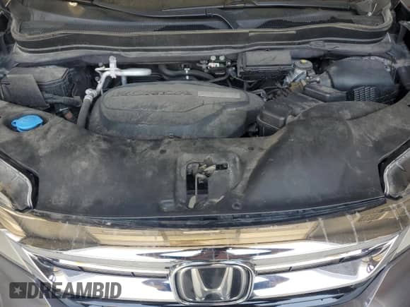 2020 Honda Pilot Touring 8-Passenger z VIN 5FNYF6H95LB058179, wystawiony jako Copart lot #67393775 z przebiegiem 120 055 mil mil oraz Szkoda całkowita • Salvage title. Historia ofert i sprzedaży dostępna na DreamBid. Obrazek 12.